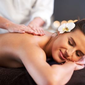relaxed-smiling-woman-receiving-back-massage-spa2-min-scaled-q1t5bedundlzy0vcip2peq72l8ea79ewpx2jvxi4qm
